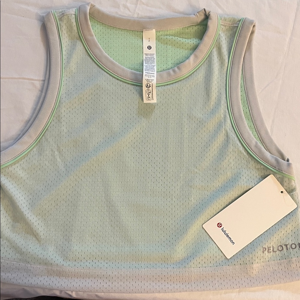 Lululemon Mint Green Perforated Top, double-layered mesh reversible tank top.